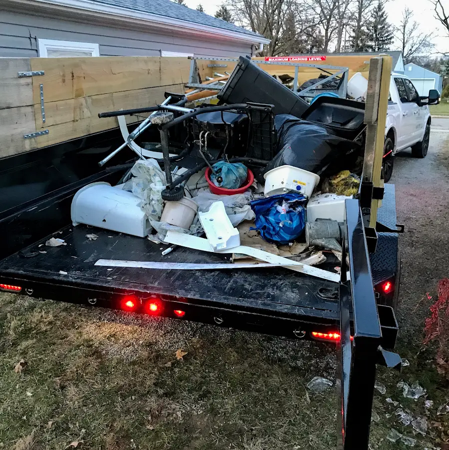 Roll-off dumpster delivered to a residential driveway in Williamsburg
